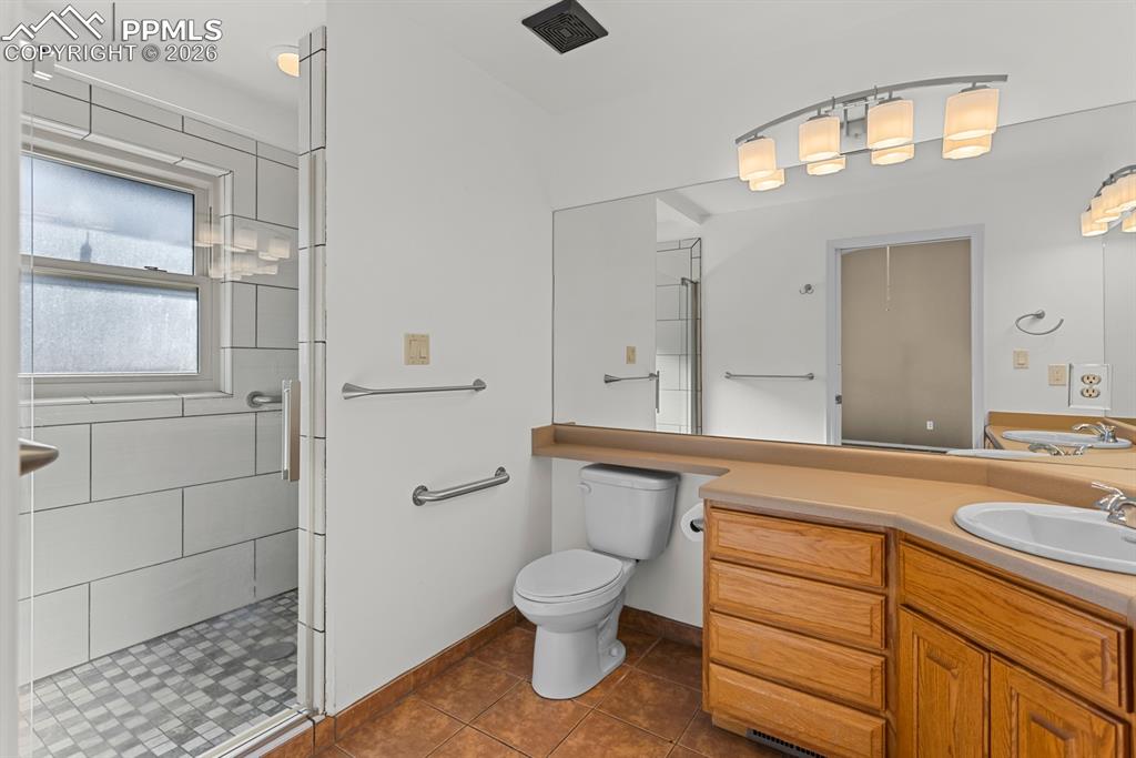 Image 27 of 50: Primary 3/4 bathroom