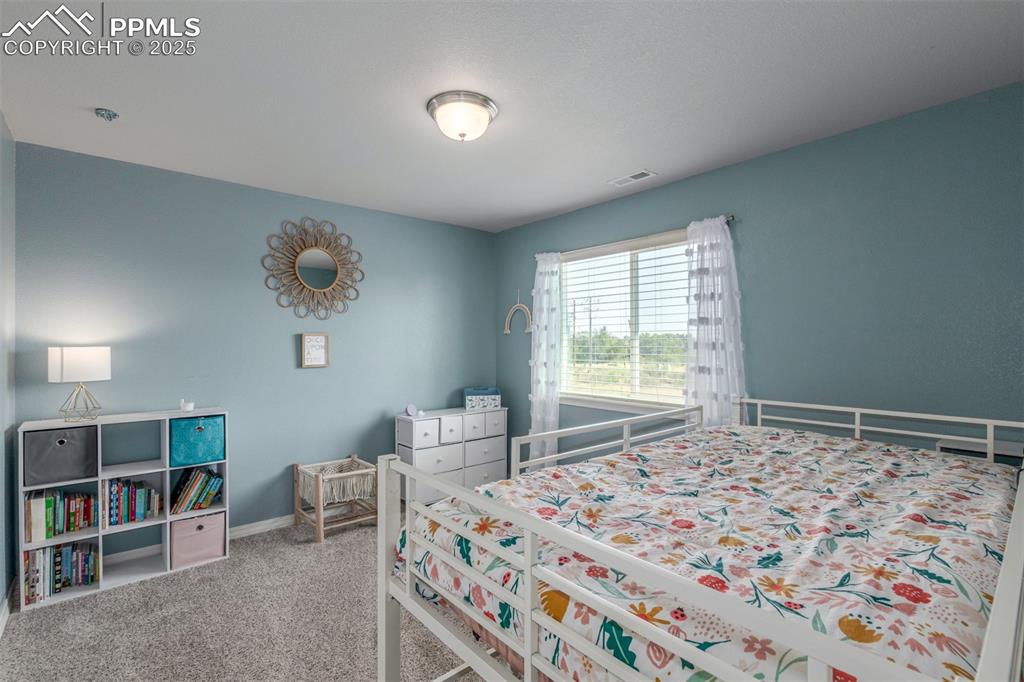 Image 27 of 40: Bedroom