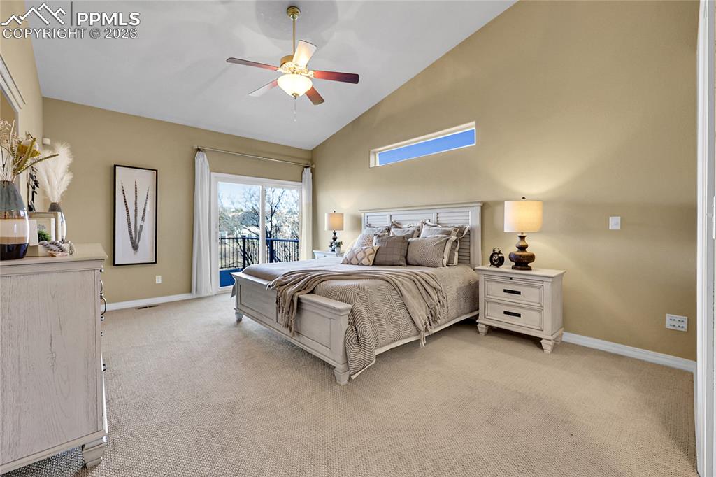 Image 12 of 44: Primary Bedroom w/Walk Out to Large Backyard Deck