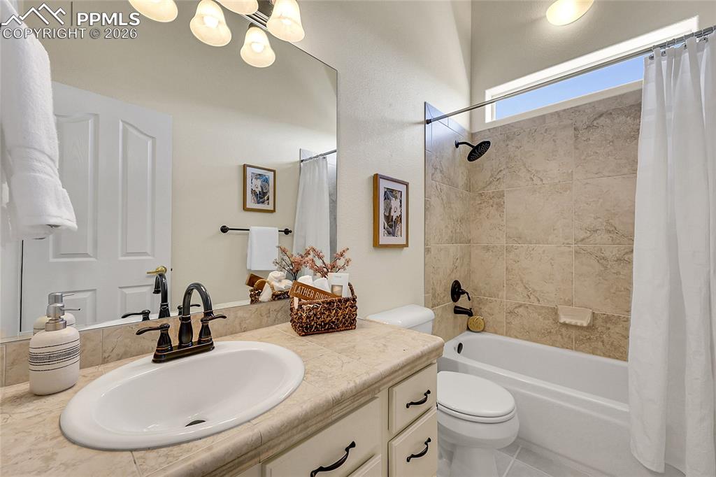 Image 18 of 44: Hall Full Bathroom