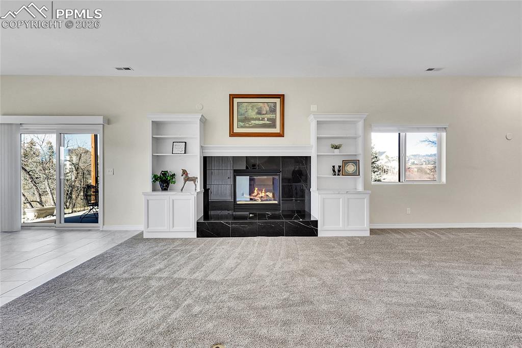 Image 22 of 44: 2nd Fireplace in Walk Out Basement