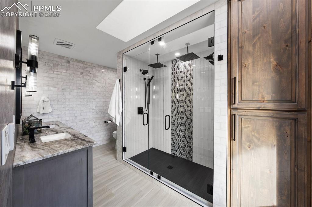 Image 14 of 27: Master Bathroom