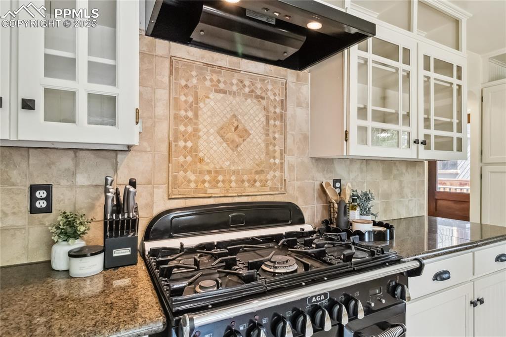 Image 12 of 49: Kitchen featuring AGA Legacy Multi-Function Gas Range & Glide out Broiler