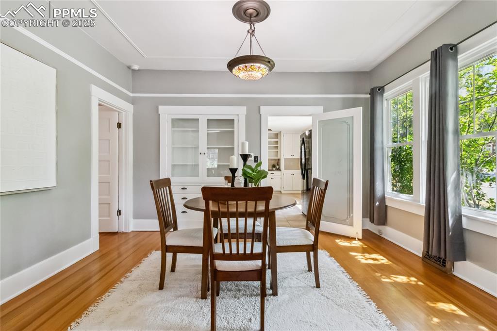 Image 6 of 49: Seamless flow from dining to living