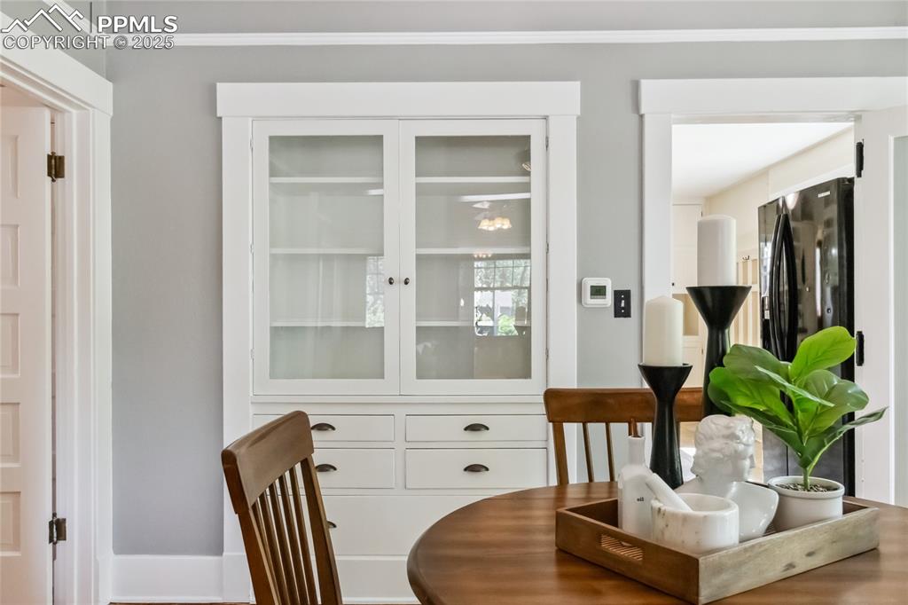 Image 7 of 49: Custom built-in dining room cabinetry