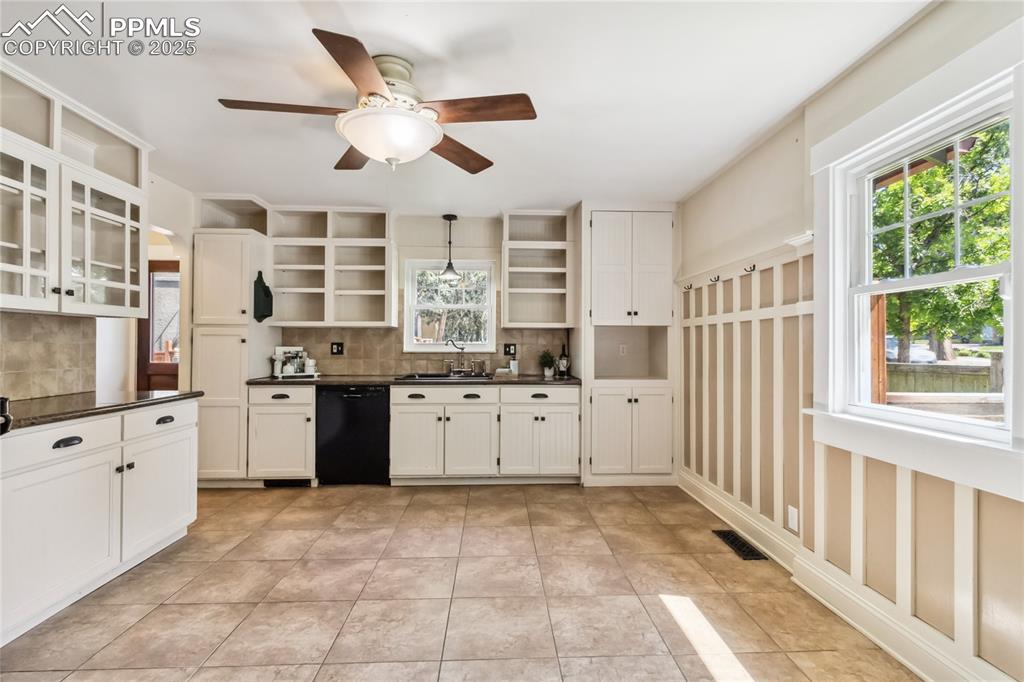 Image 9 of 49: Eat-in kitchen with ample cabinet storage