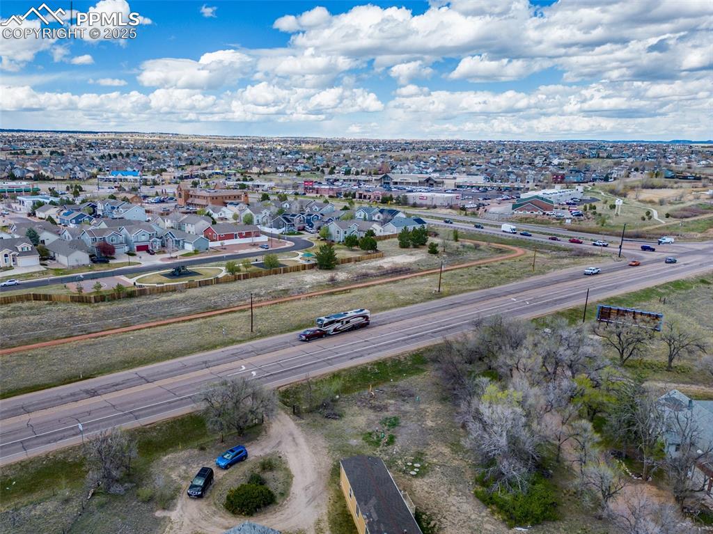 Image 3 of 7: Aerial view featuring a residential view