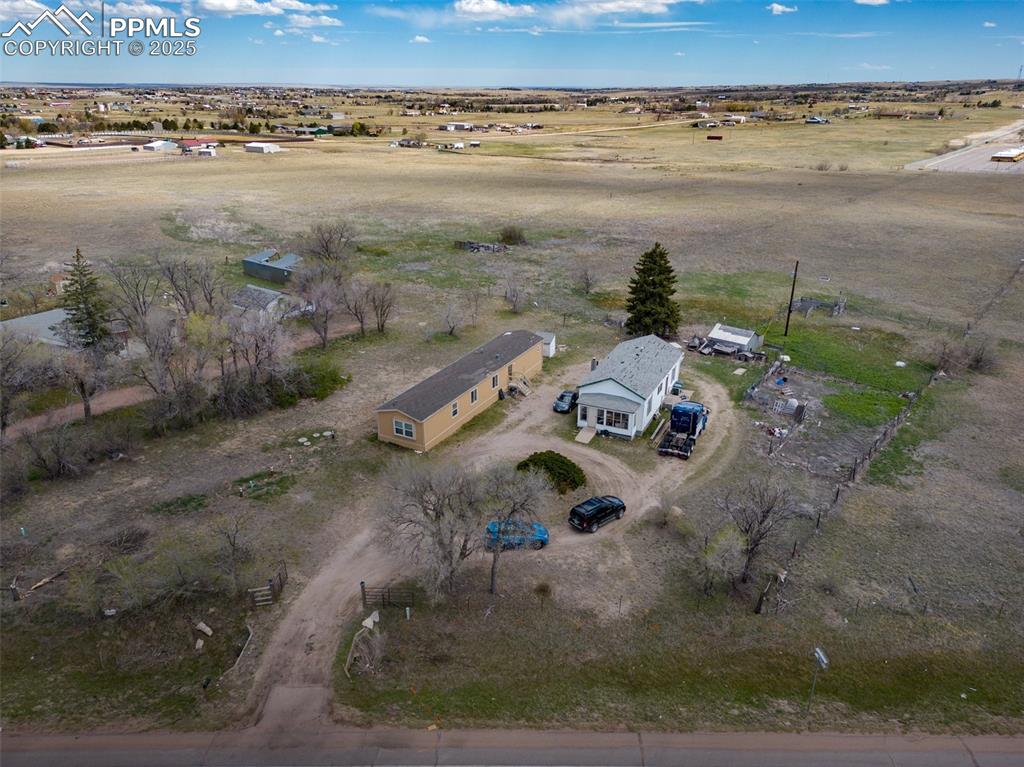 Image 5 of 7: Birds eye view of property featuring a rural view