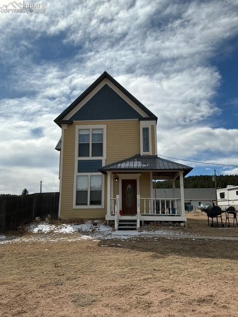 Image 1 of 36: View of front facade with covered porch