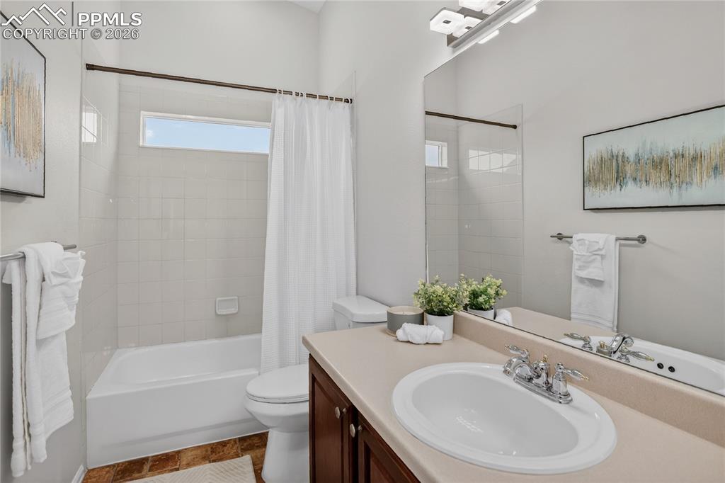 Image 19 of 29: Full guest bath - main level