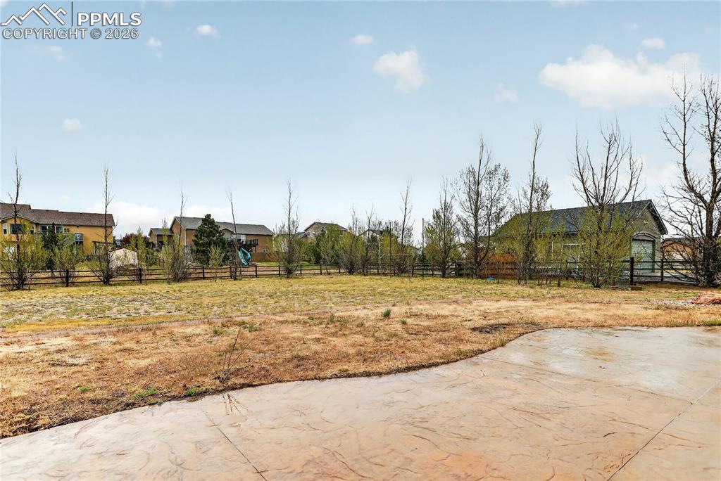 Image 27 of 29: Stamped concrete patio