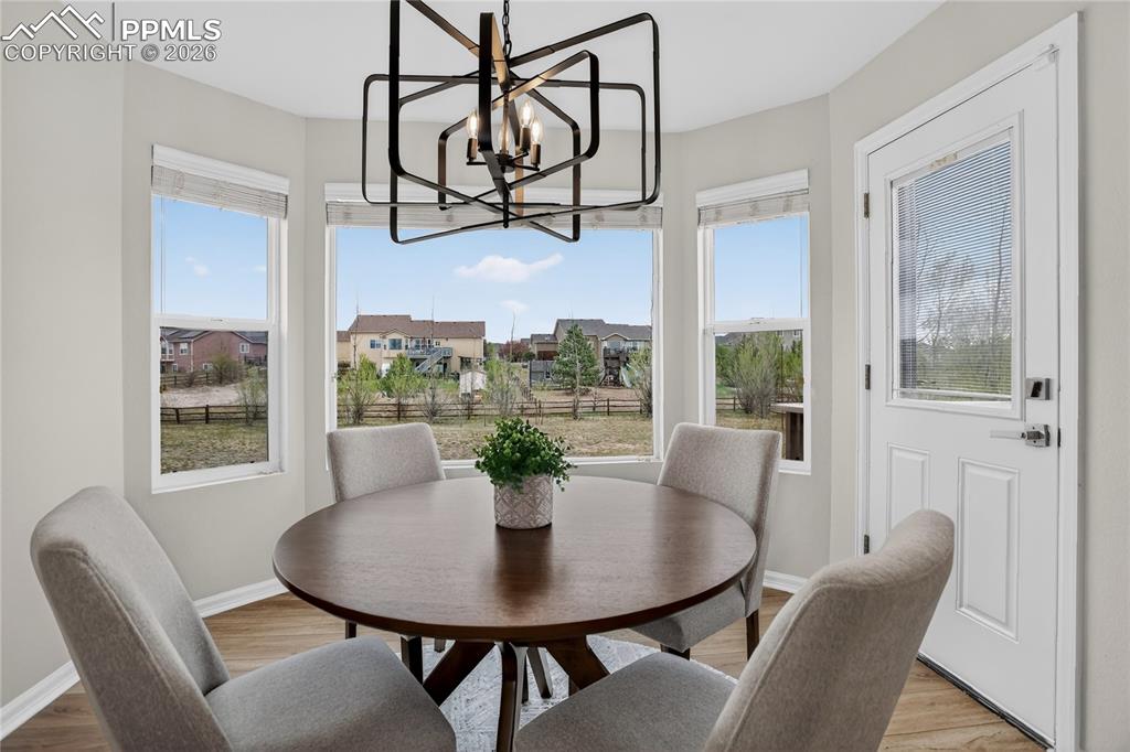 Image 6 of 29: Breakfast nook w/ walk-out