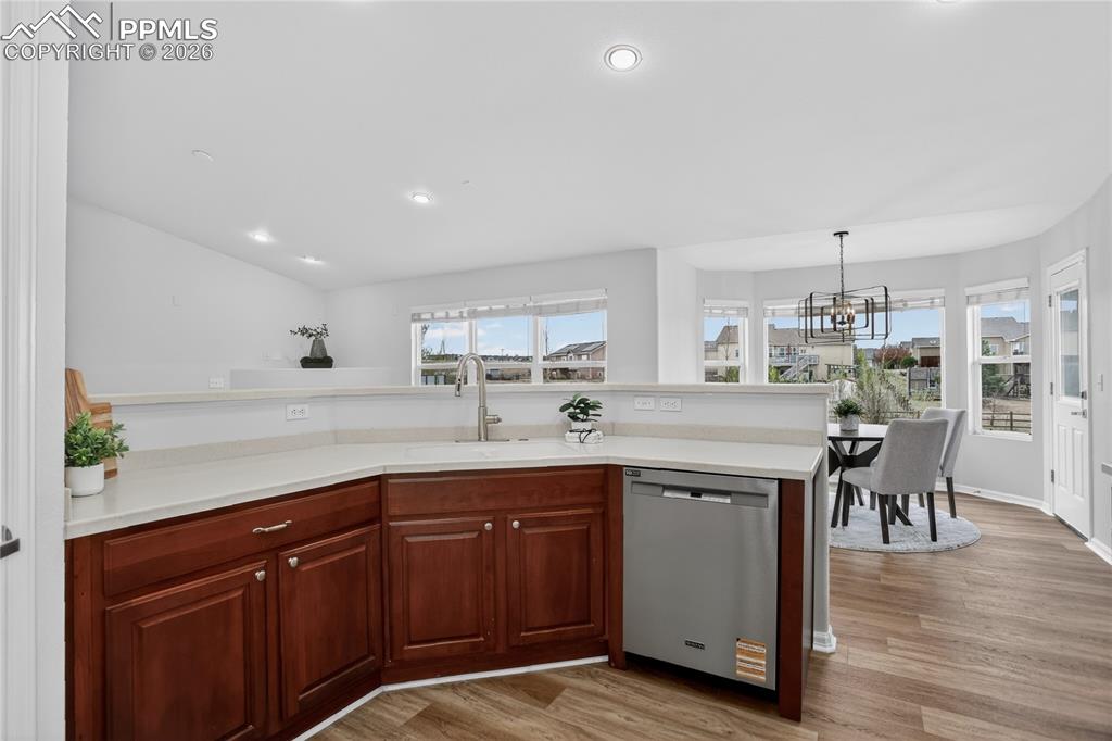 Image 8 of 29: Barstool seating at kitchen counter