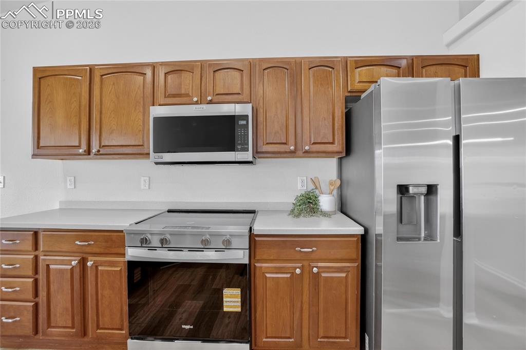 Image 9 of 29: SS appliances - new stove & dishwasher