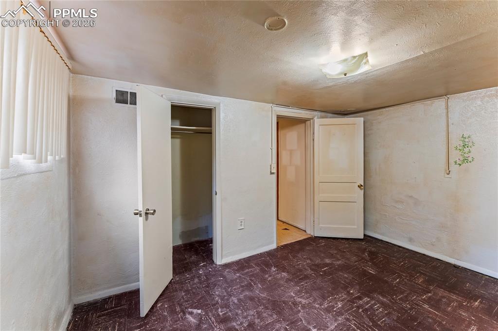 Image 23 of 28: Bedroom