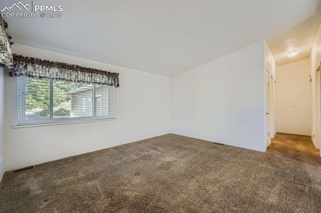 Image 6 of 29: View of carpeted empty room