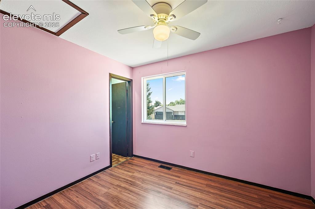 Image 10 of 37: Upper level bedroom.