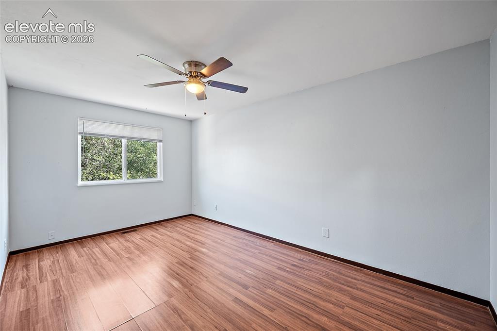Image 13 of 37: Upper level primary bedroom.