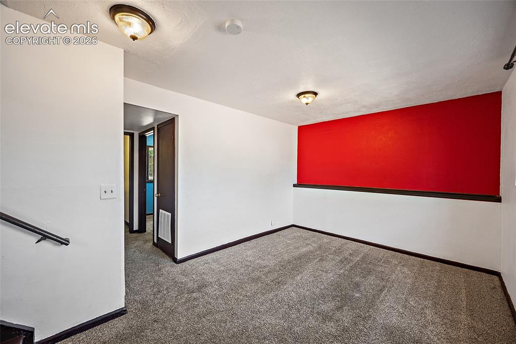 Image 16 of 37: Lower level family room.