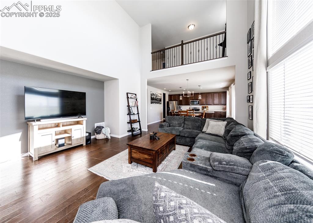 Image 13 of 43: The great room is open and spacious... It will handle all of your comfy fur