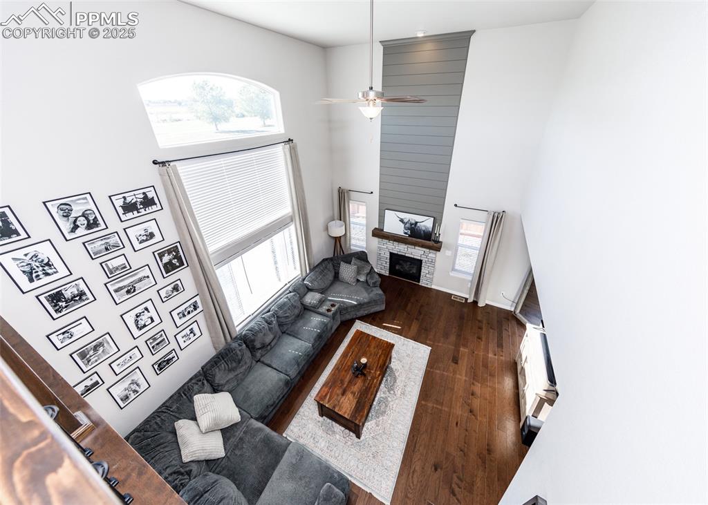 Image 16 of 43: Birdseye view of the great room from loft above.