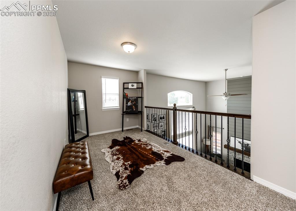 Image 33 of 43: This loft has lots of flexible space... Sitting Room? Office? You decide.