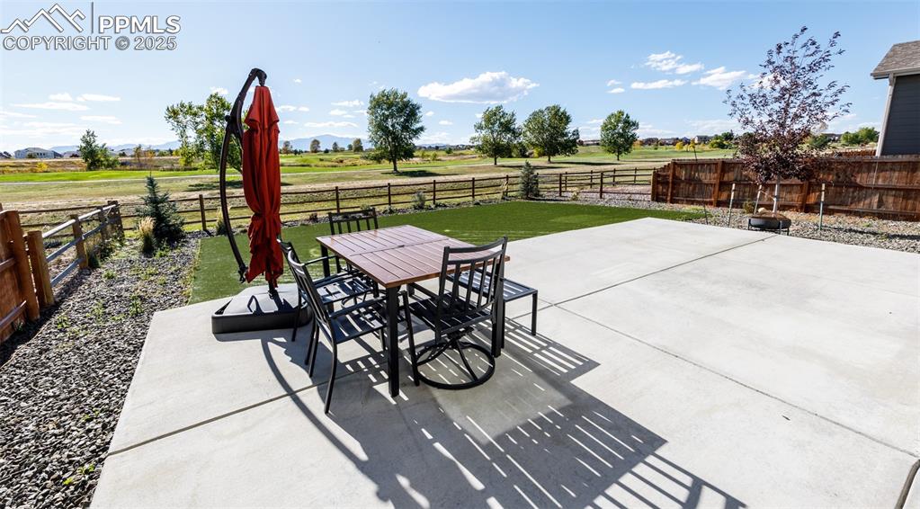 Image 39 of 43: Enjoy gorgeous views of the peak as you sit on your huge concrete patio. No