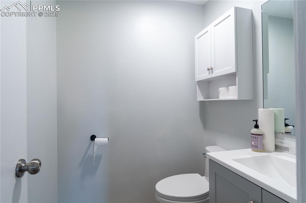 Image 15 of 37: Bathroom with vanity and toilet