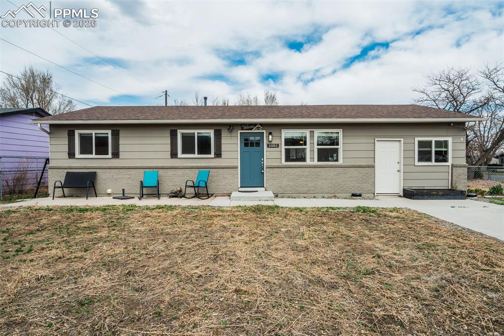 Image 1 of 29: Single story home featuring brick siding, a patio area, and roof with shing