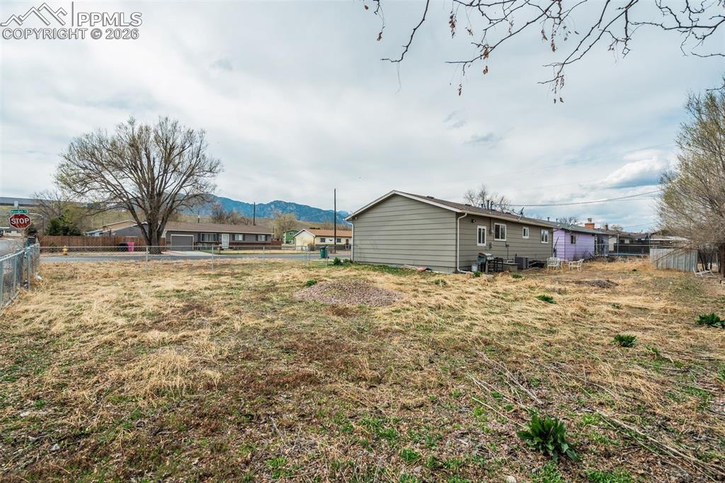 Image 25 of 29: View of yard with a mountain view