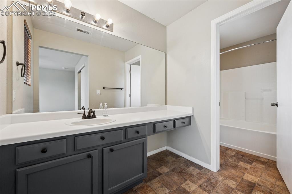 Image 12 of 21: Master Bathroom