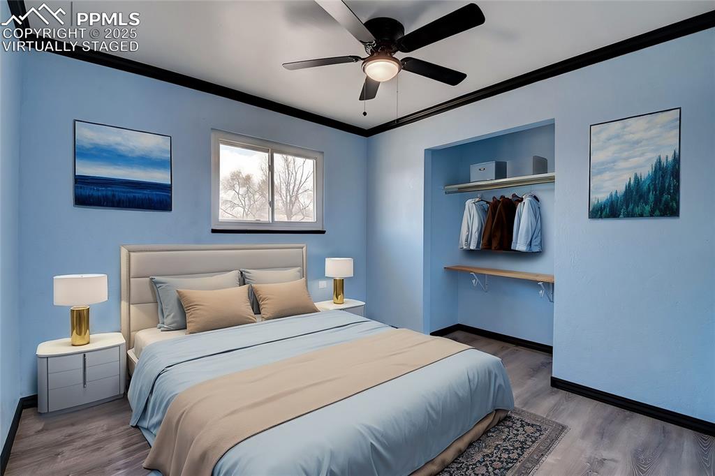 Image 16 of 30: Virtually Staged 2nd bedroom main level
