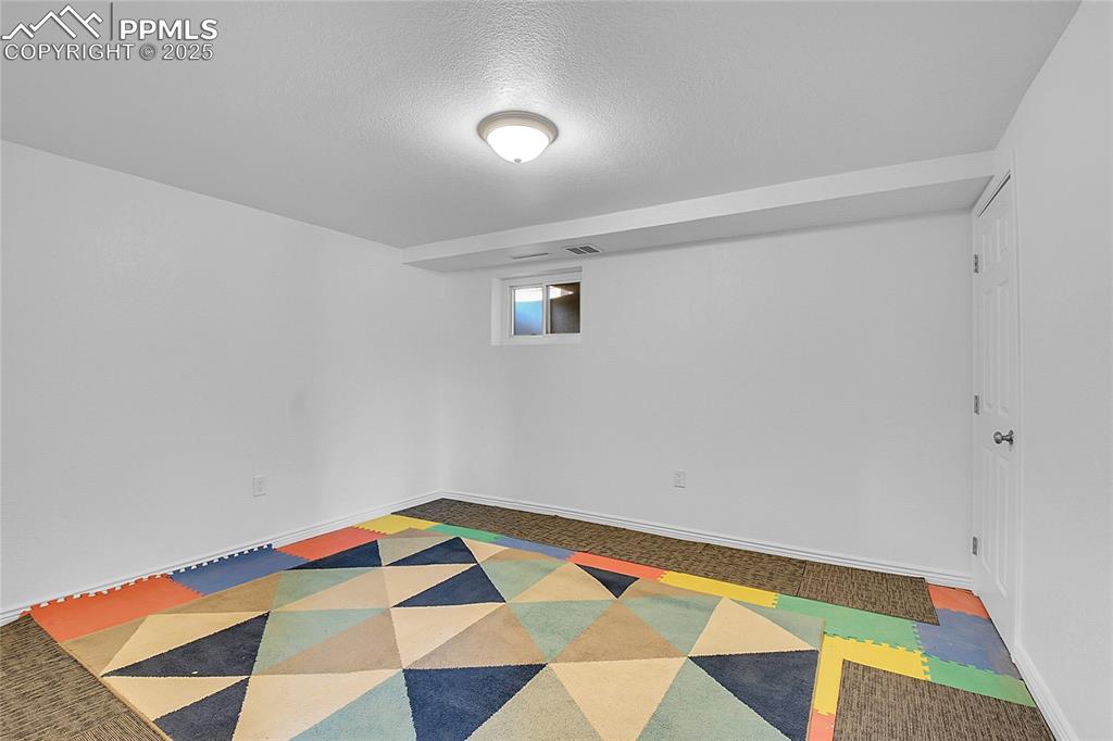 Image 29 of 30: bonus room / office - basement level