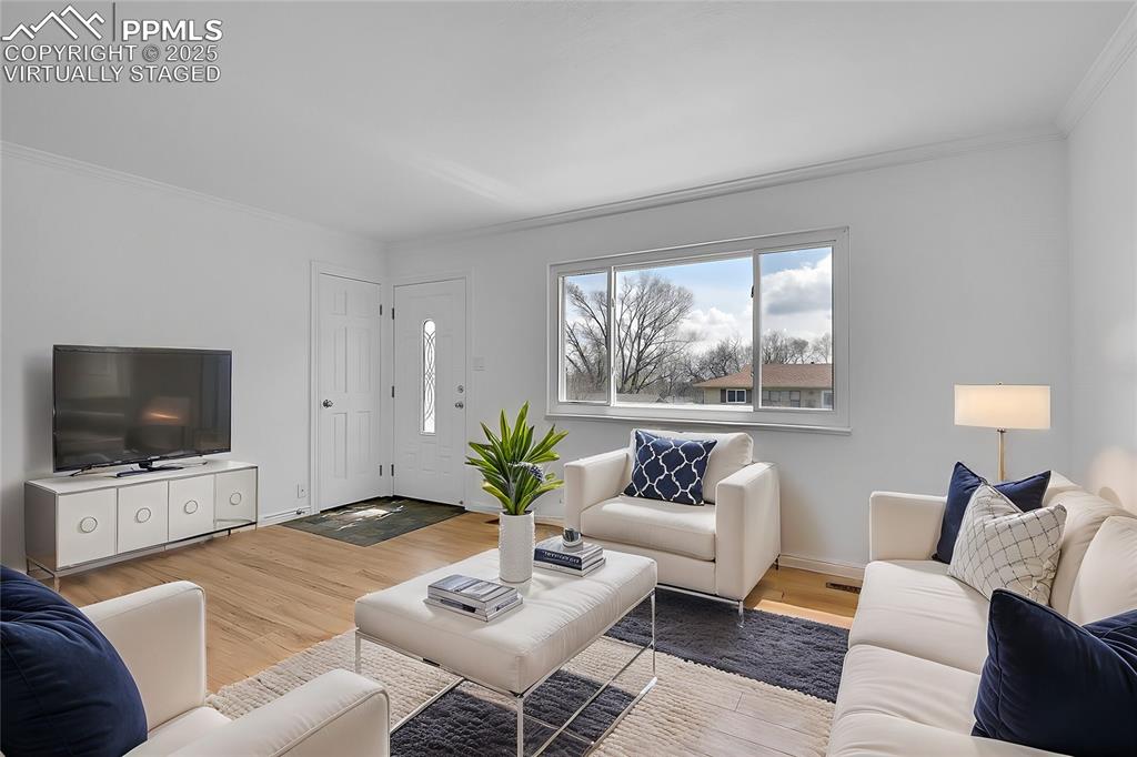 Image 3 of 30: Virtually Staged - living room - main level