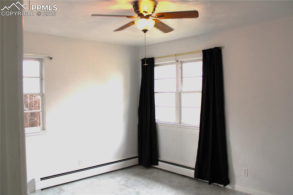 Image 11 of 24: Second bedroom