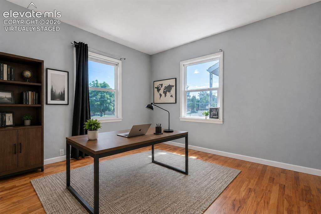 Image 15 of 39: Virtually Staged - Wood flooring, 6-panel doors, built-in closet system