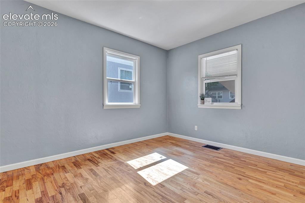 Image 19 of 39: Wood flooring, 6 panel doors