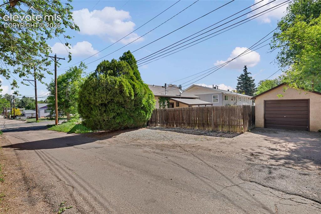 Image 36 of 39: Alley access, garage has power and attached shed