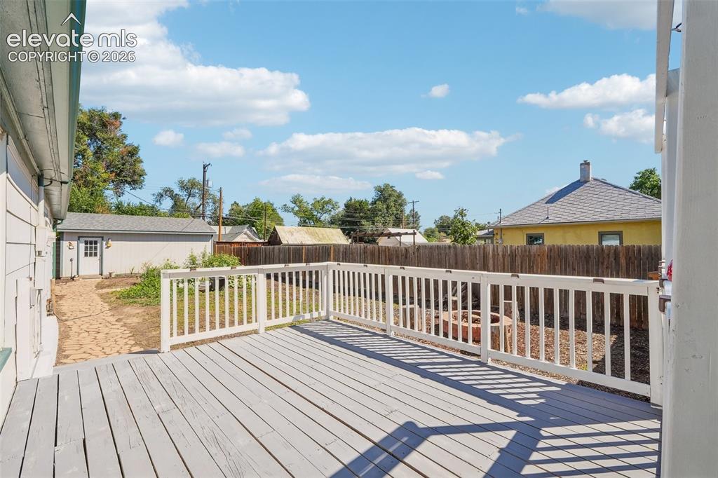 Image 14 of 43: Deck off sunroom