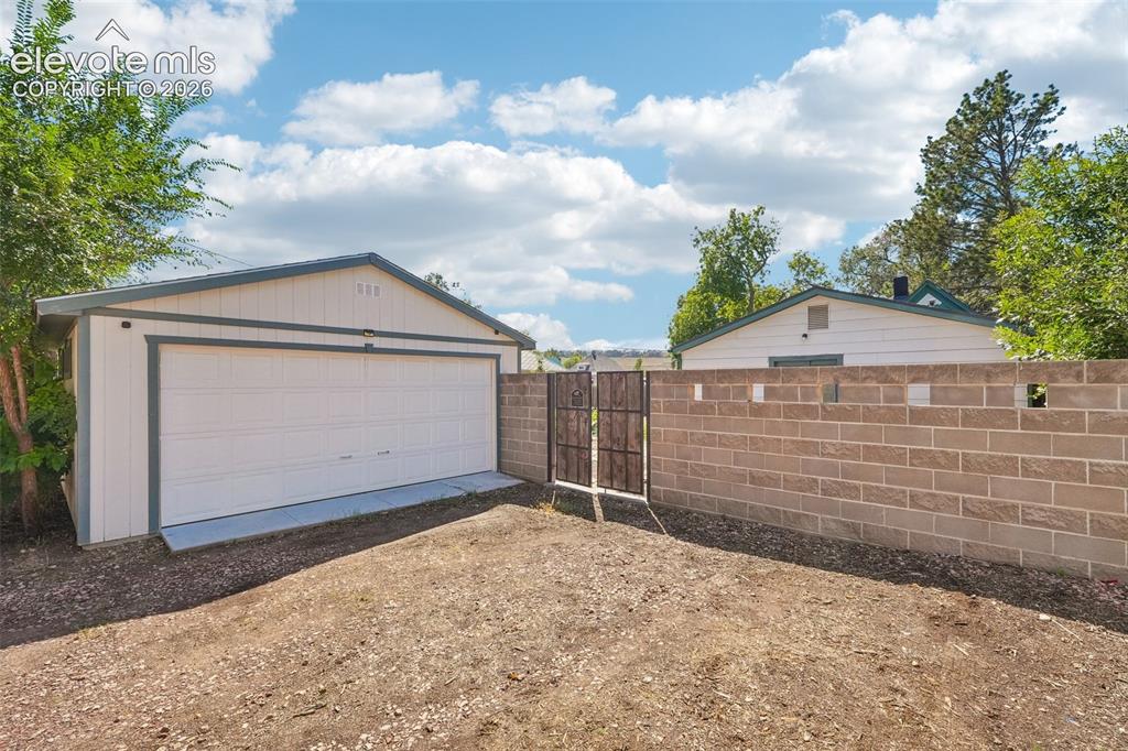 Image 41 of 43: Alley access to ample parking and 2 car detached garage