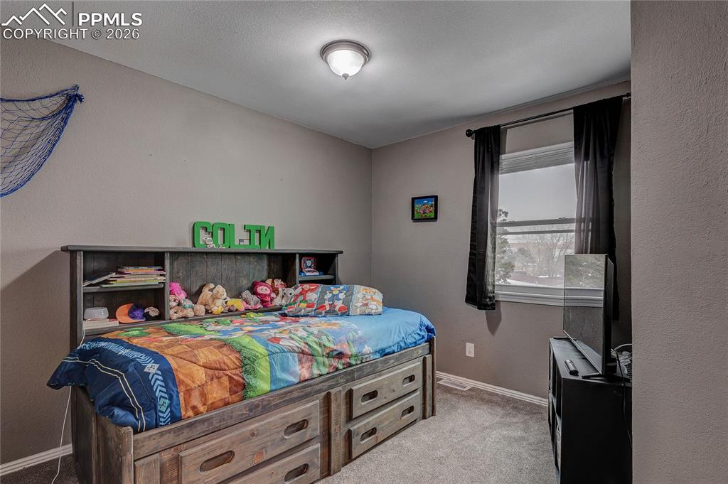 Image 18 of 39: Bedroom