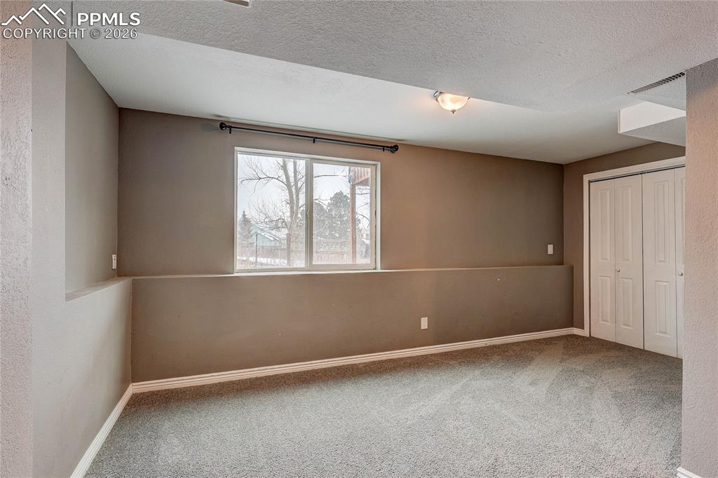 Image 24 of 39: Bedroom