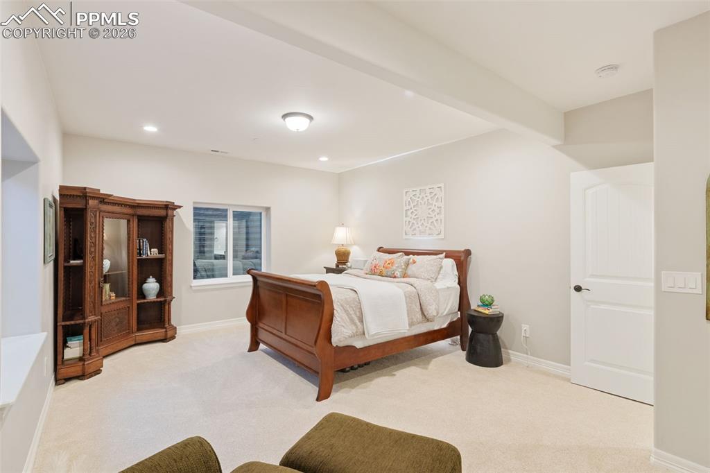 Image 32 of 49: Another generously sized suite demonstrates the home