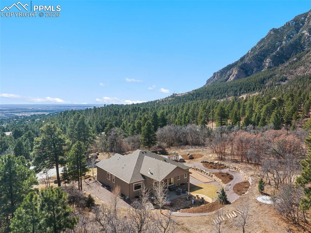 Image 47 of 49: Nestled directly against the foothills, the property offers a rare combinat
