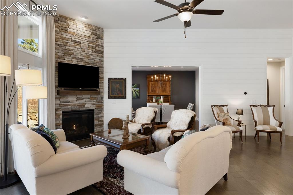 Image 5 of 49: Strategic sightlines connect the living room directly to the dining area, e