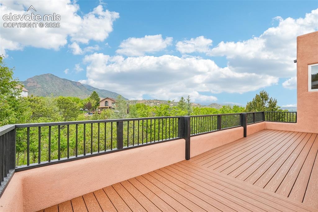 Image 35 of 50: Walk out deck off of bedroom 2 highlighting this amazing southwestern conte