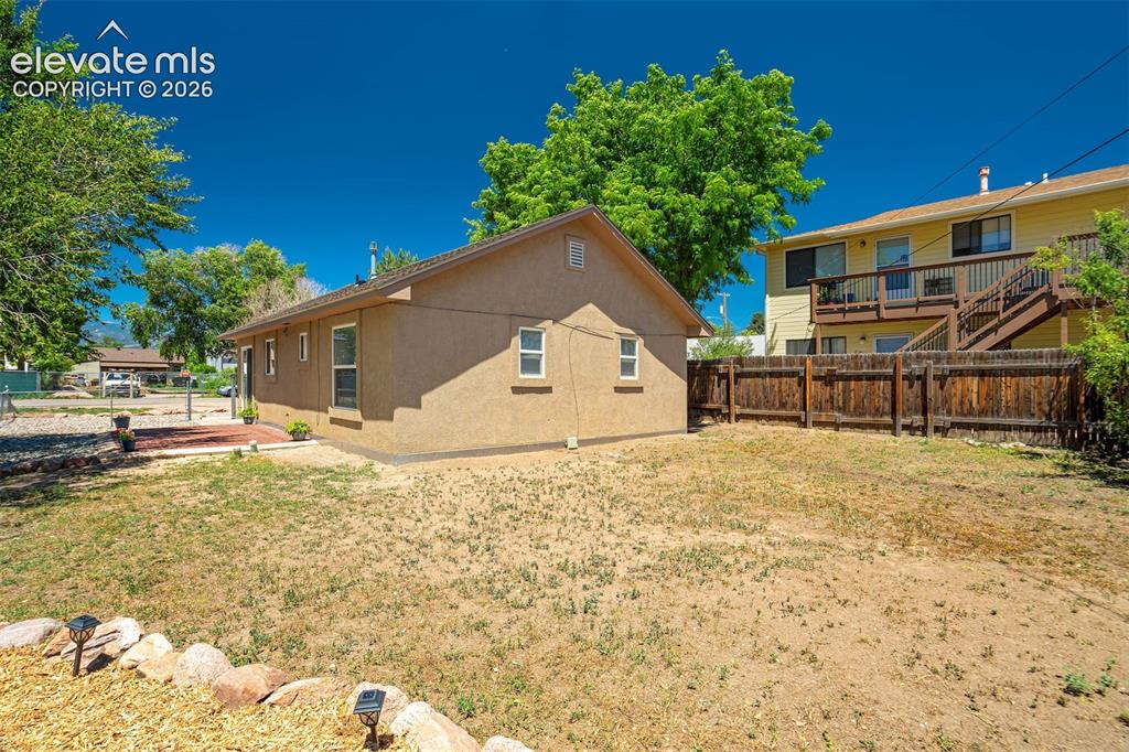 Image 28 of 29: Blank slate if you want to add more landscape OR low maintenance as it is. 