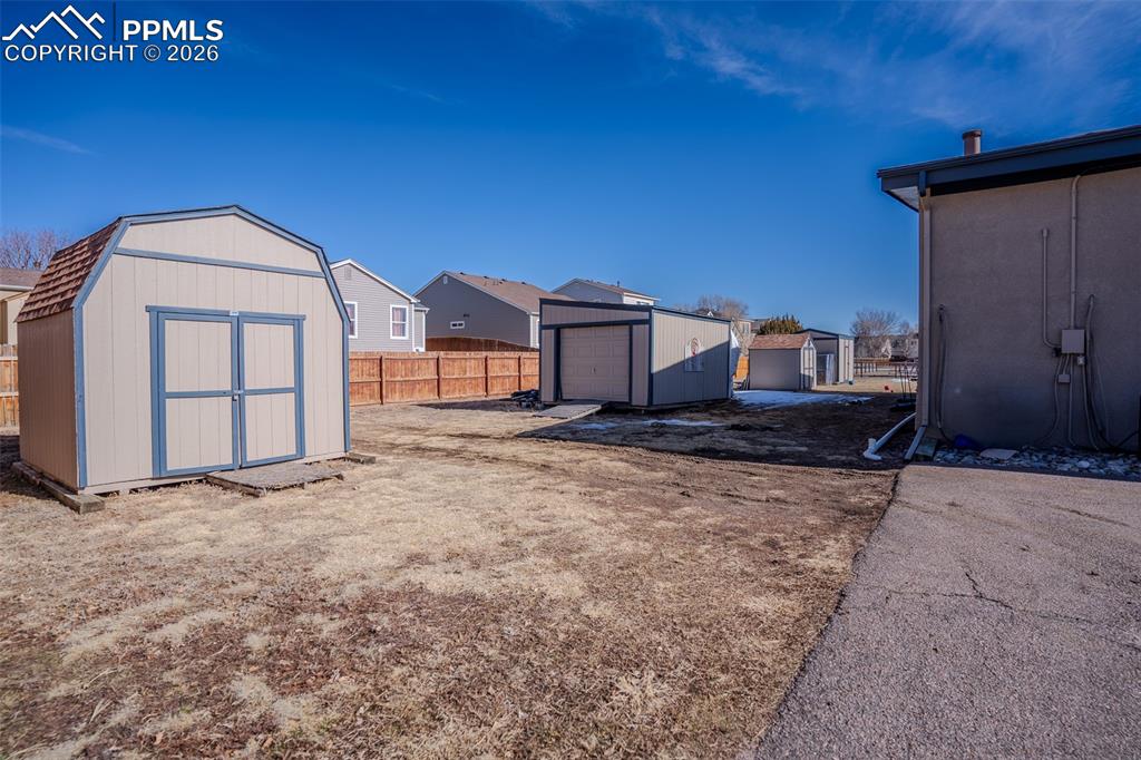 Image 20 of 26: Multiple sheds