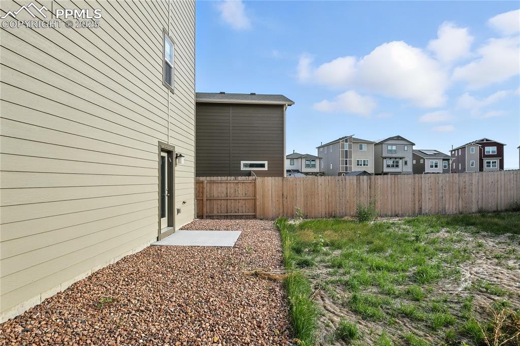 Image 28 of 28: View of yard featuring a residential view