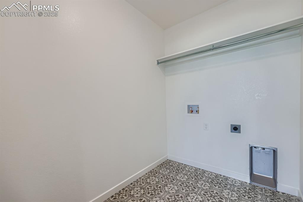 Image 25 of 28: Washroom with electric dryer hookup and hookup for a washing machine